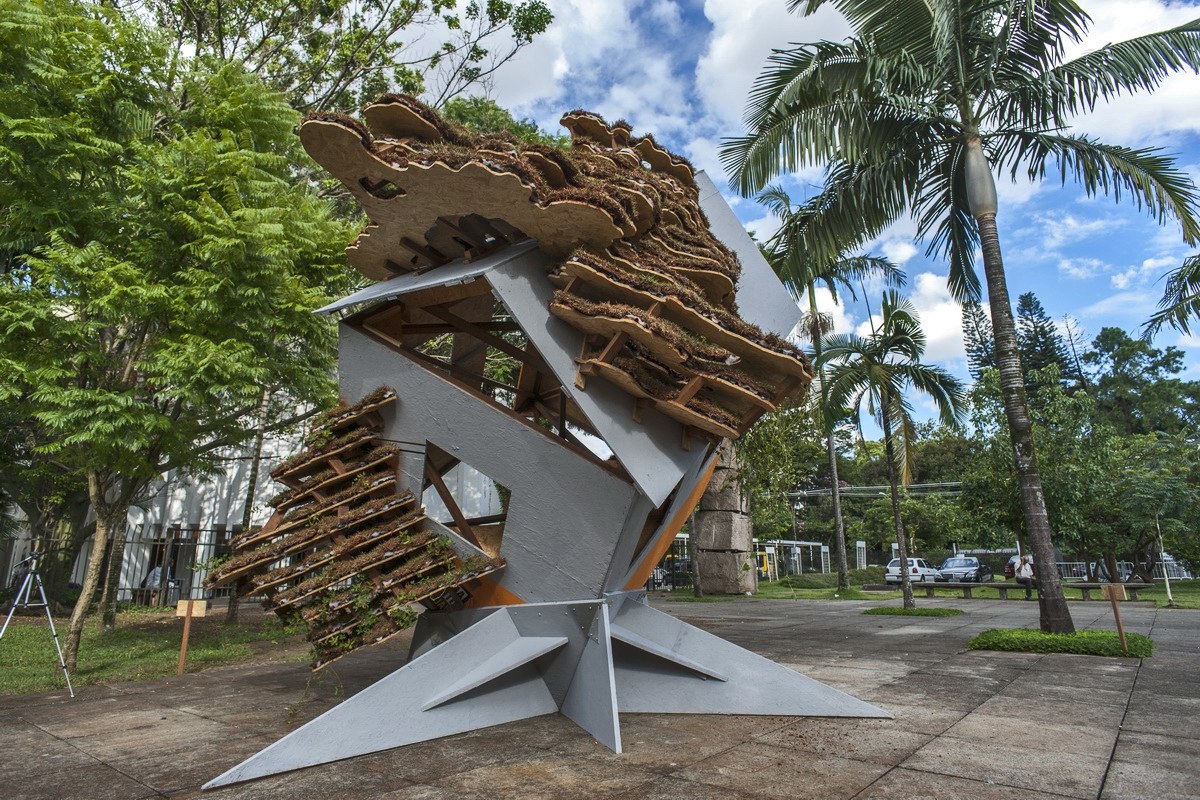 Cloudy Thoughts pavilion among palms and concrete at MuBE